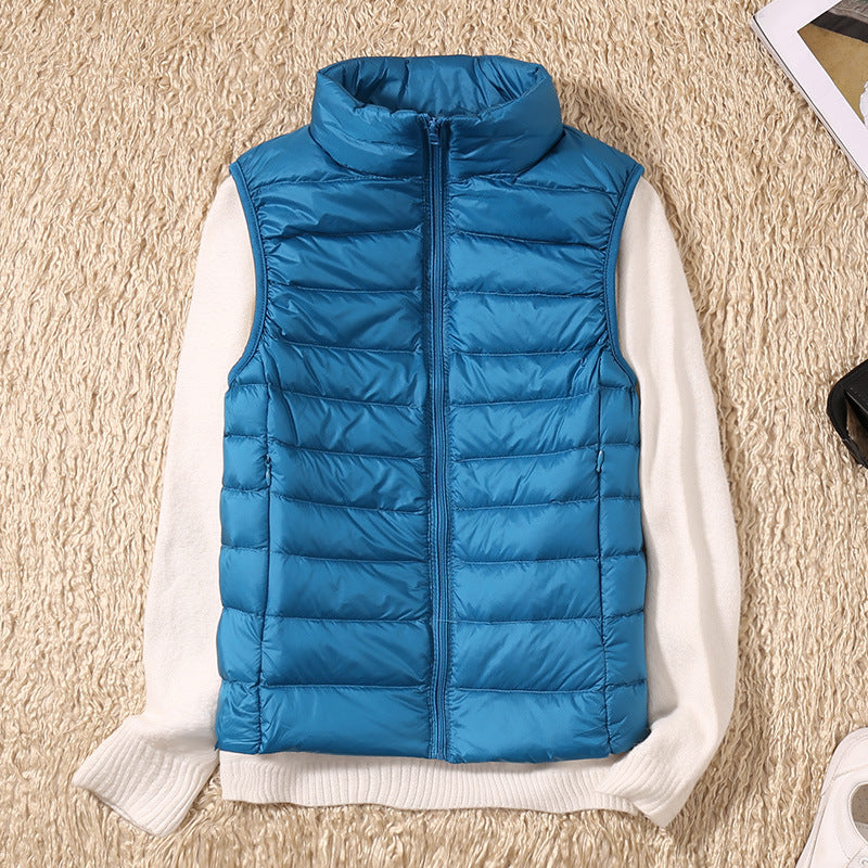 Clara Women's Waterproof Vest | White Duck Down Insulation 9